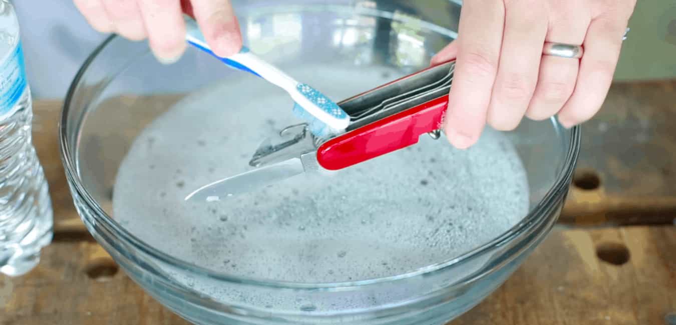 Cleaning Swiss Army Knife by Using Warm Water